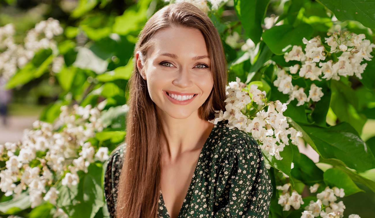 Beautiful Smile Woman in Flowers