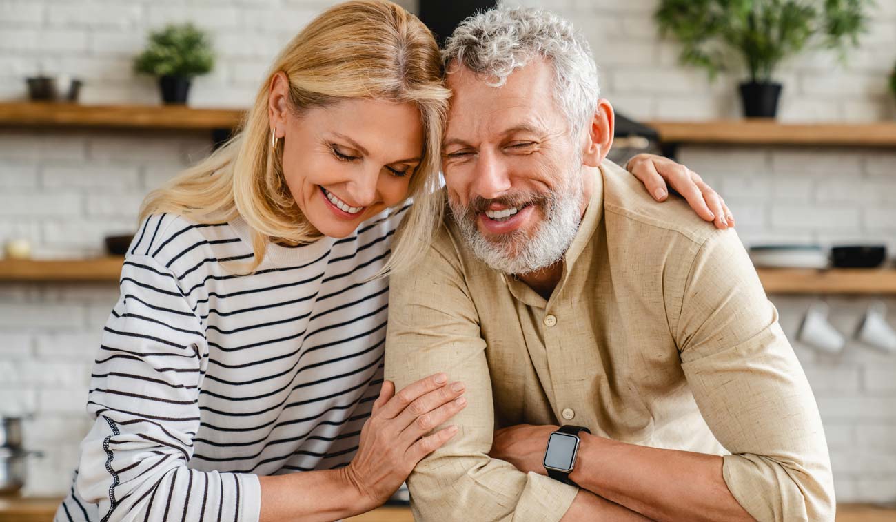 Happy Couple Smiling Dental Implants