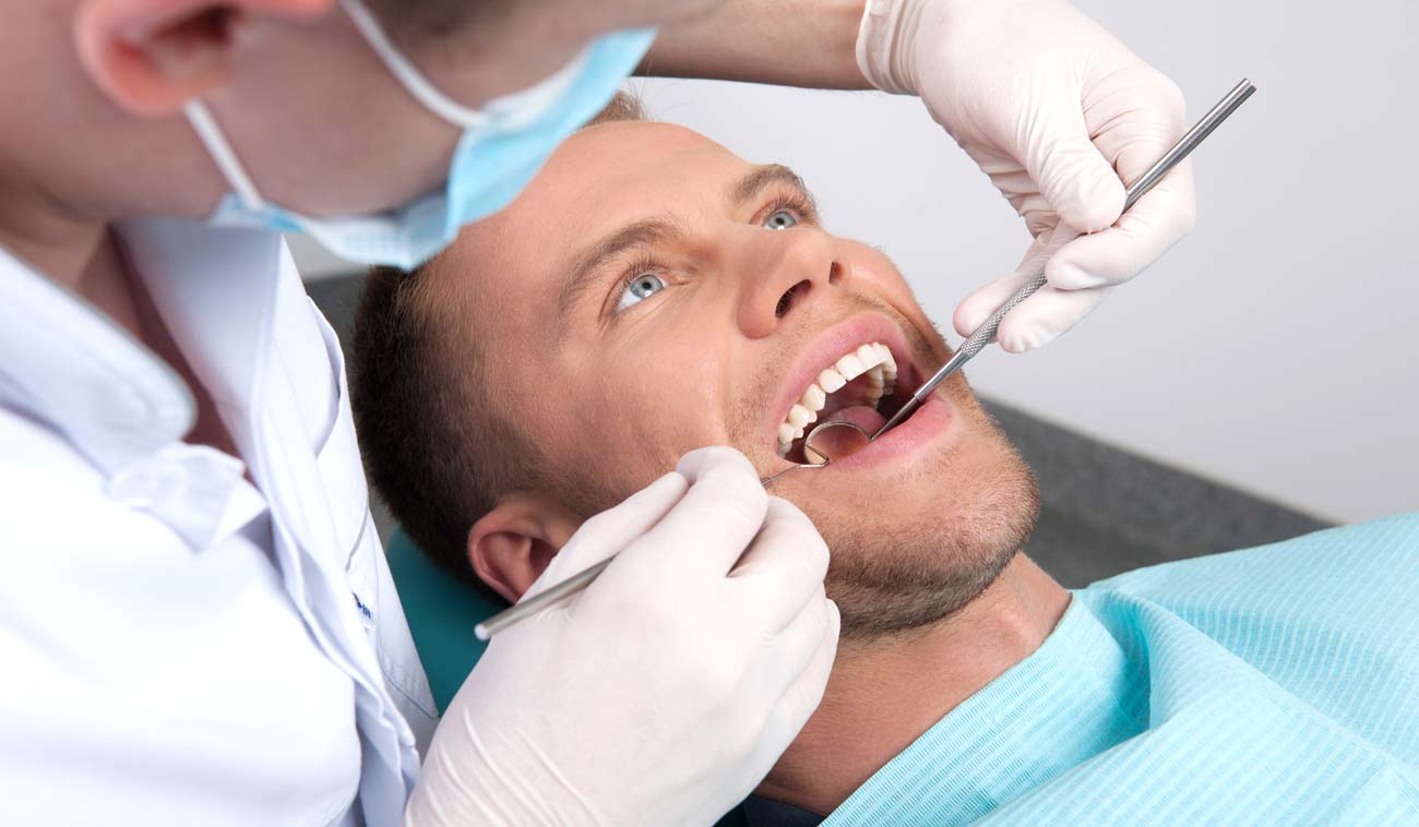 Man Getting Dental Exam